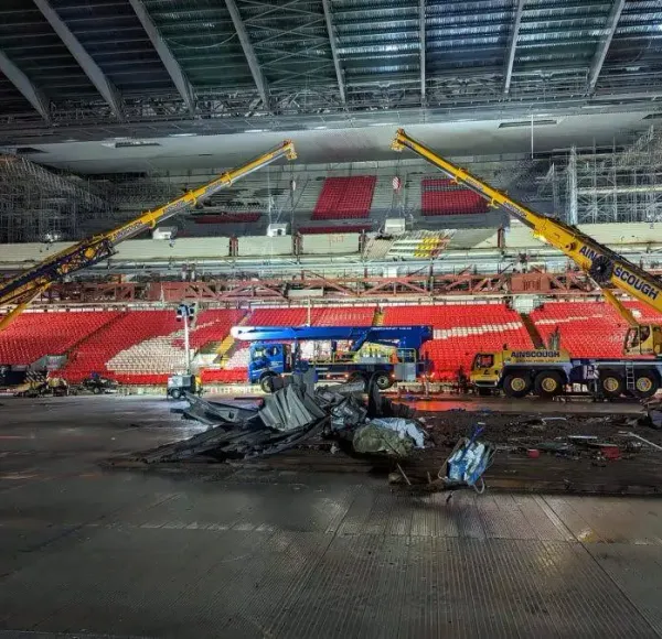 Mobile cranes working inside a stadium