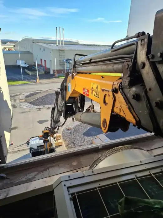 Lifting equipment in use on a crane hire job