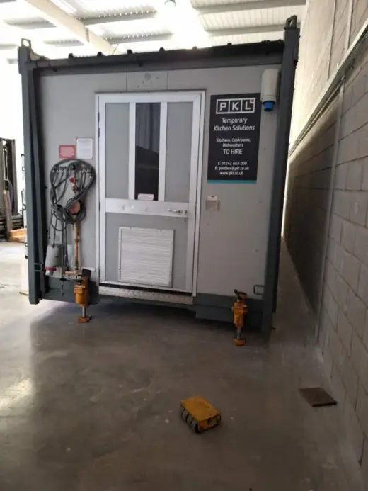 Portable cabin positioned inside an industrial unit