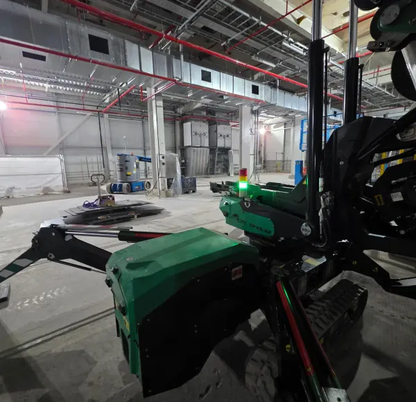 Close-up of a spider crane inside a building